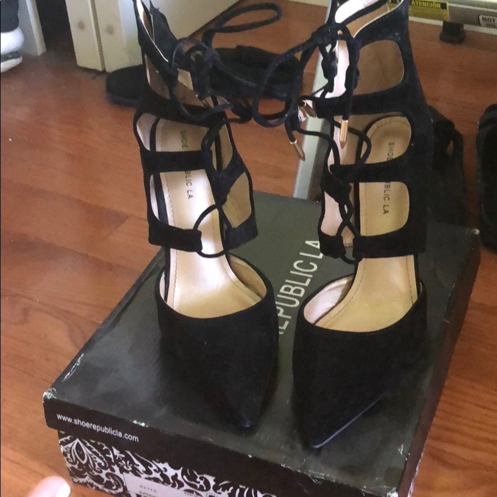 Black shoe republica strap up heels.